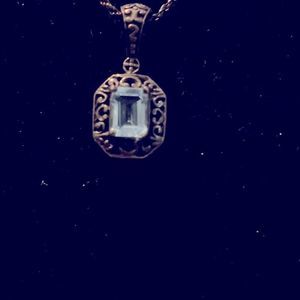 Beautiful sterling silver necklace with blue topaz.